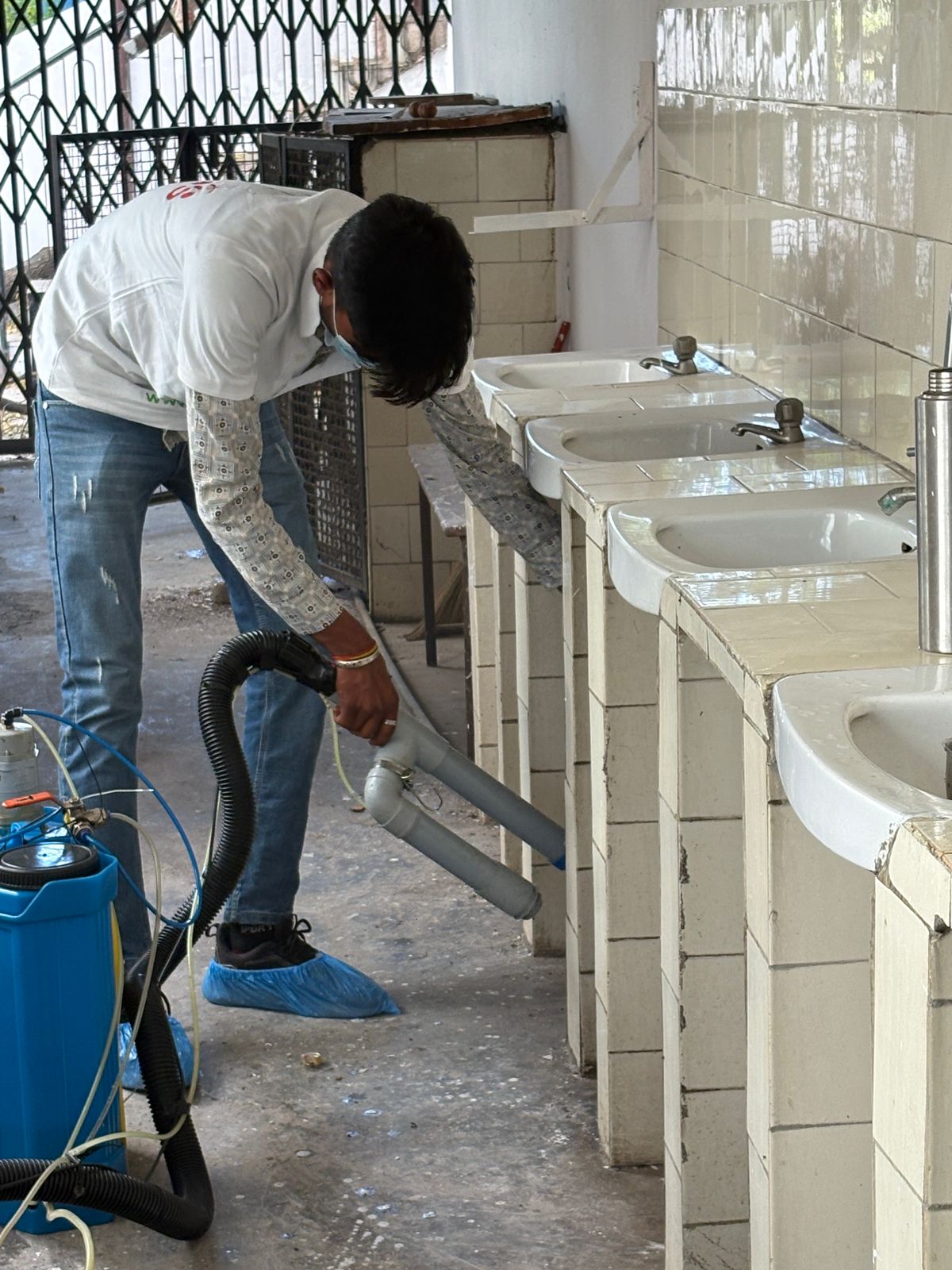 Sanitizing washroom facilities